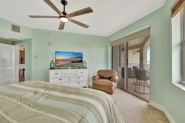 carpeted bedroom featuring access to outside, visible vents, ceiling fan, and baseboards