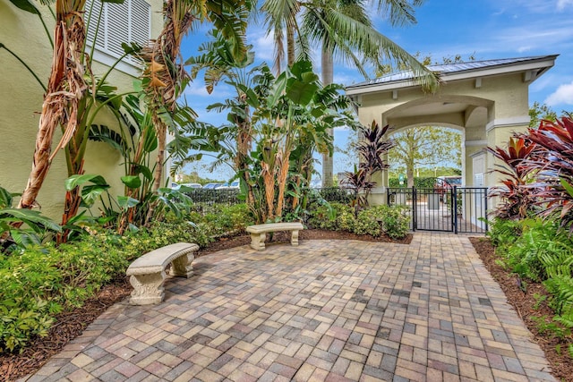 view of patio / terrace with fence and a gate