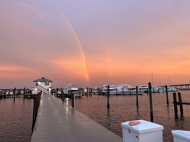 dock area featuring a water view and boat lift