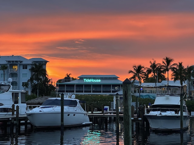 view of dock with a water view and boat lift