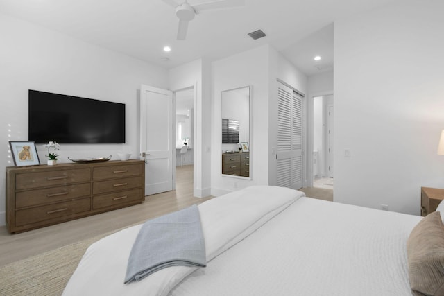 bedroom with recessed lighting, visible vents, ceiling fan, ensuite bath, and light wood-type flooring