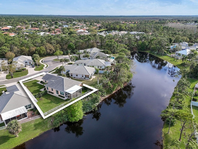 aerial view featuring a water view and a residential view