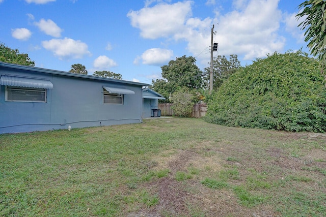 view of yard featuring fence