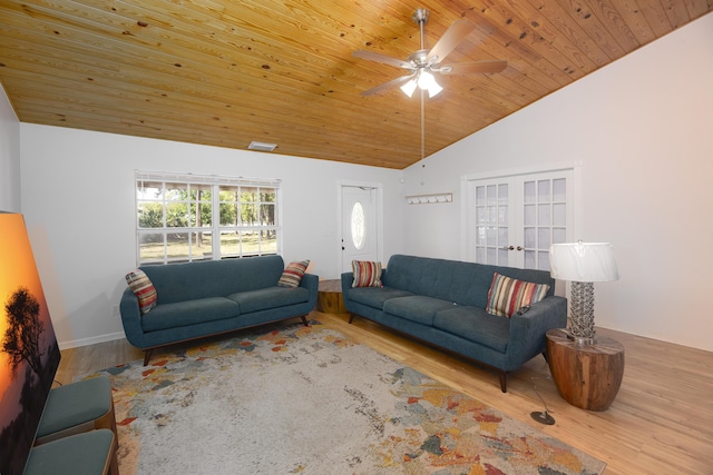 living room featuring baseboards, wood ceiling, wood finished floors, vaulted ceiling, and french doors