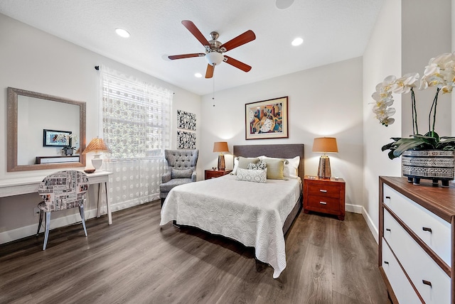 bedroom featuring recessed lighting, baseboards, and dark wood-style flooring