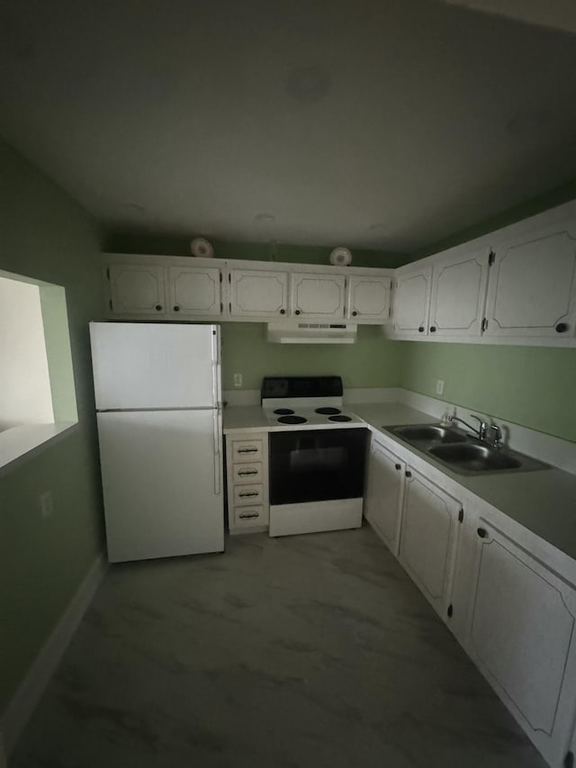 kitchen featuring baseboards, white appliances, under cabinet range hood, a sink, and white cabinetry