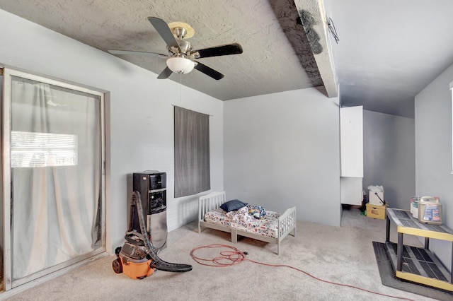 interior space with ceiling fan and beam ceiling