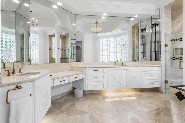 full bathroom featuring plenty of natural light, crown molding, and a sink