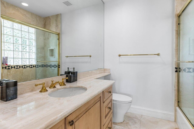 bathroom featuring baseboards, visible vents, toilet, an enclosed shower, and vanity