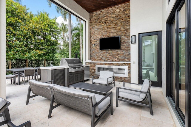 view of patio featuring outdoor dining area and area for grilling