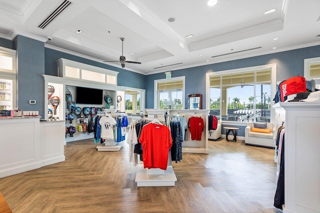 interior space featuring crown molding, recessed lighting, visible vents, a towering ceiling, and a ceiling fan