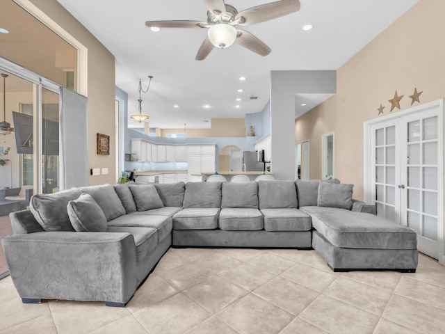 living area featuring recessed lighting, french doors, ceiling fan, and light tile patterned floors