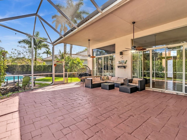 view of patio / terrace featuring a fenced in pool, glass enclosure, outdoor lounge area, and a ceiling fan