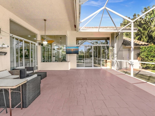 view of patio with a lanai