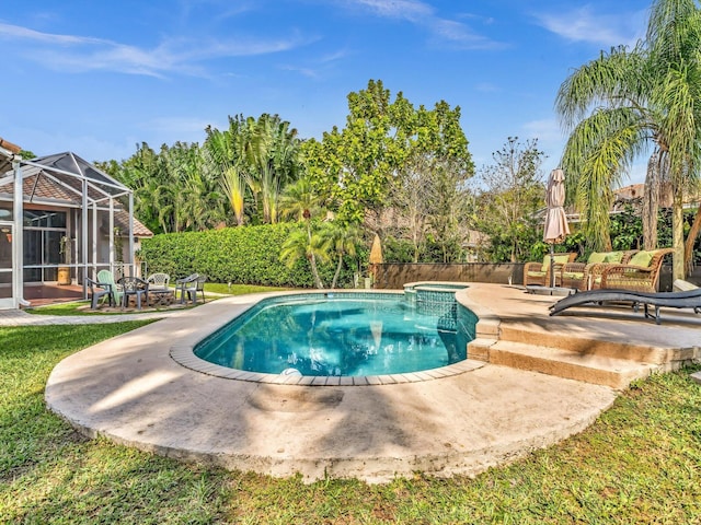 pool with glass enclosure and a patio