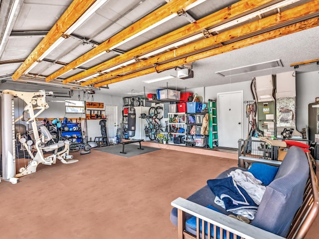 interior space with water heater and attic access