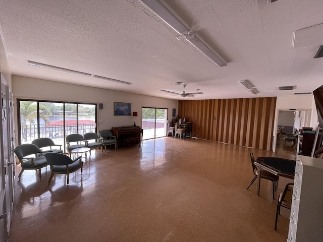 interior space with visible vents and a textured ceiling