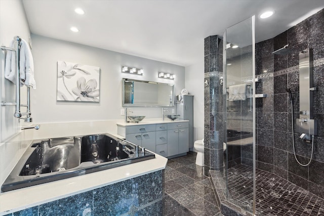 bathroom with toilet, granite finish floor, recessed lighting, and a stall shower