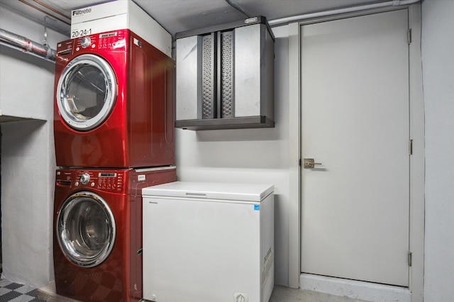 laundry room featuring laundry area and stacked washer and dryer