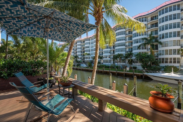 wooden deck with a water view