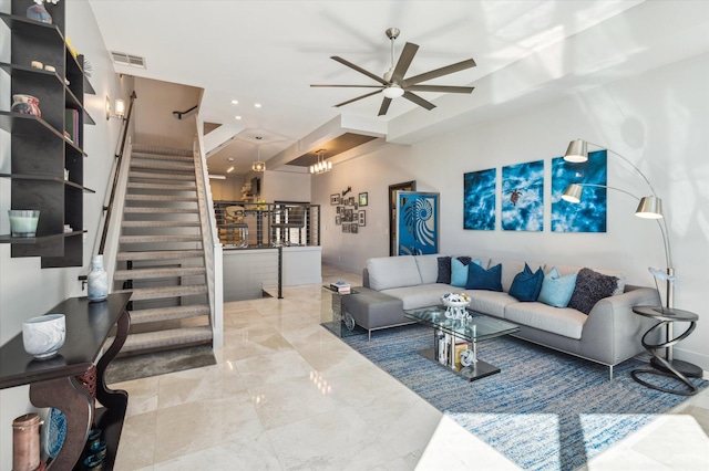 living area with visible vents, ceiling fan, stairway, recessed lighting, and marble finish floor