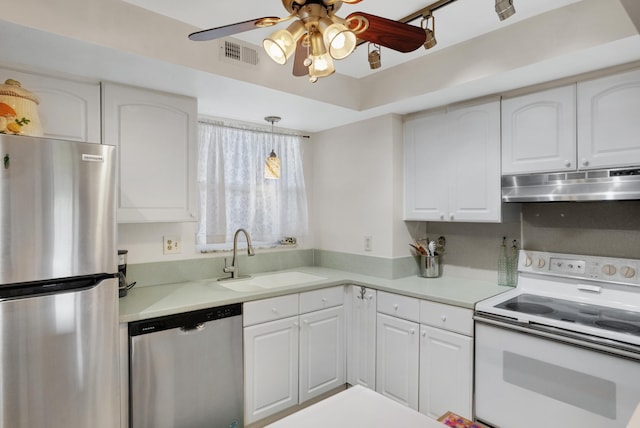 kitchen with visible vents, appliances with stainless steel finishes, under cabinet range hood, white cabinetry, and a sink