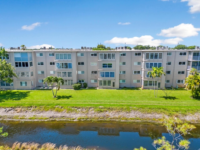 view of property with a water view