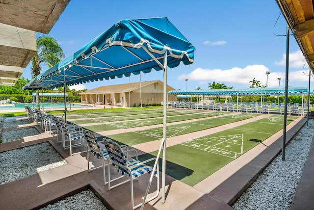 view of community featuring shuffleboard