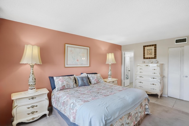 bedroom with visible vents