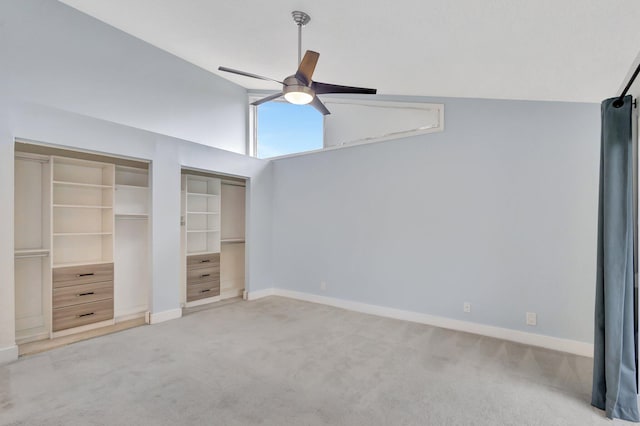 unfurnished bedroom with a ceiling fan, light carpet, and baseboards