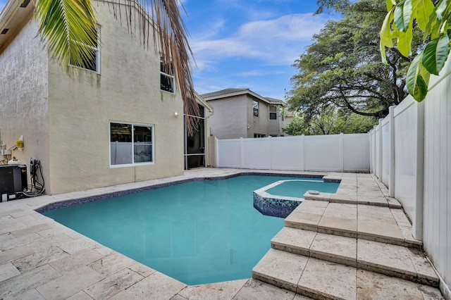 view of pool with a patio area, a fenced backyard, and a fenced in pool