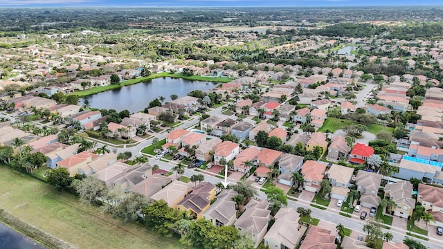 aerial view featuring a water view and a residential view