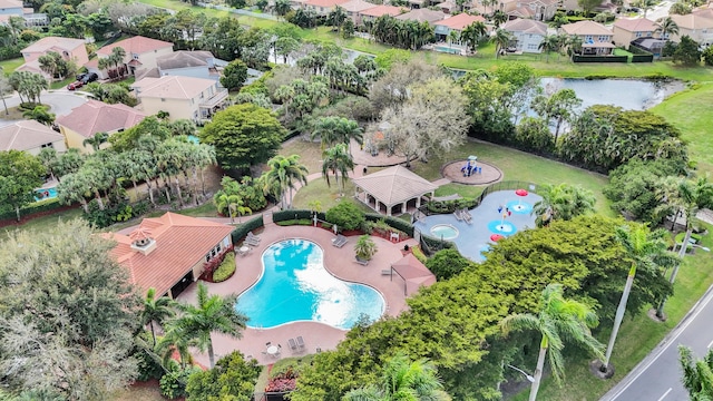 aerial view with a water view and a residential view