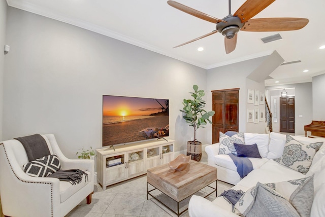 living room featuring visible vents, a ceiling fan, stairway, ornamental molding, and recessed lighting