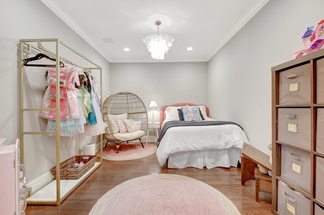 bedroom featuring recessed lighting, a notable chandelier, crown molding, and wood finished floors