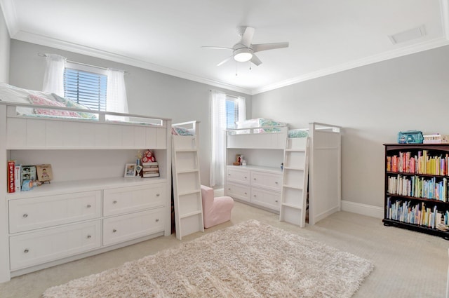 bedroom featuring a ceiling fan, light colored carpet, crown molding, and baseboards