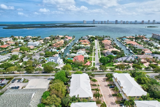 bird's eye view with a water view and a residential view