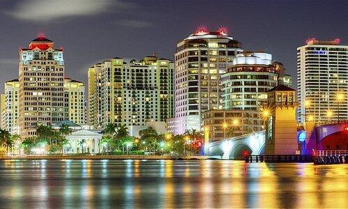 property's view of city featuring a water view