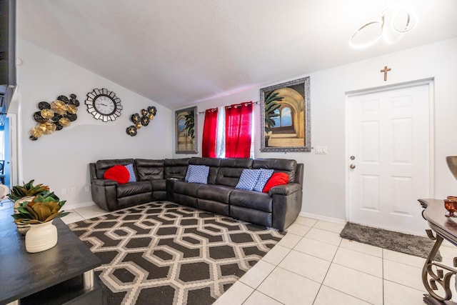 tiled living room with baseboards and vaulted ceiling