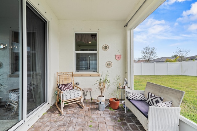 view of patio / terrace featuring fence