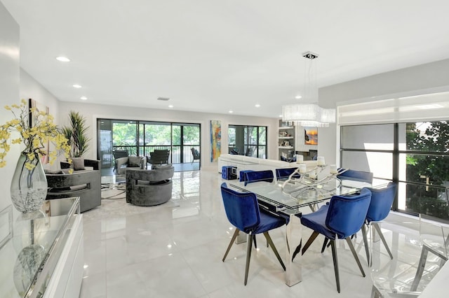 dining room featuring recessed lighting