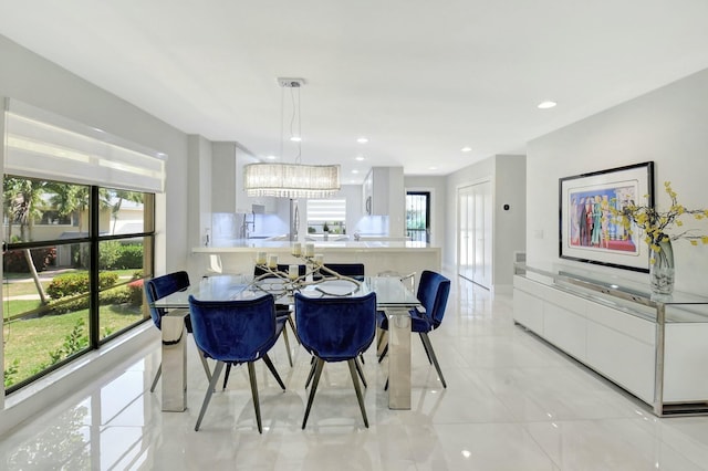 dining area featuring recessed lighting and light tile patterned floors