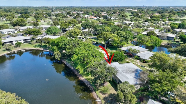 birds eye view of property featuring a residential view and a water view