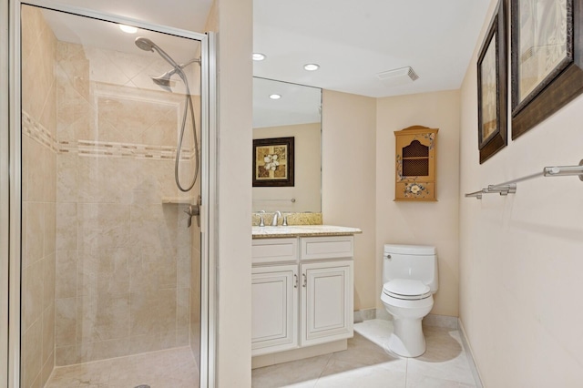 full bath with baseboards, toilet, tile patterned flooring, vanity, and a shower stall