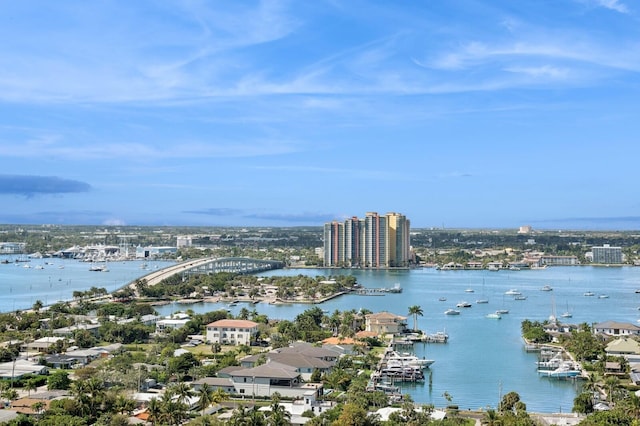 bird's eye view featuring a water view and a city view