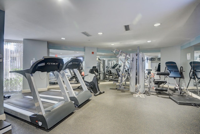 gym with recessed lighting and visible vents