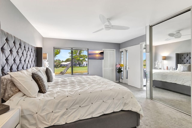 bedroom with light colored carpet and ceiling fan