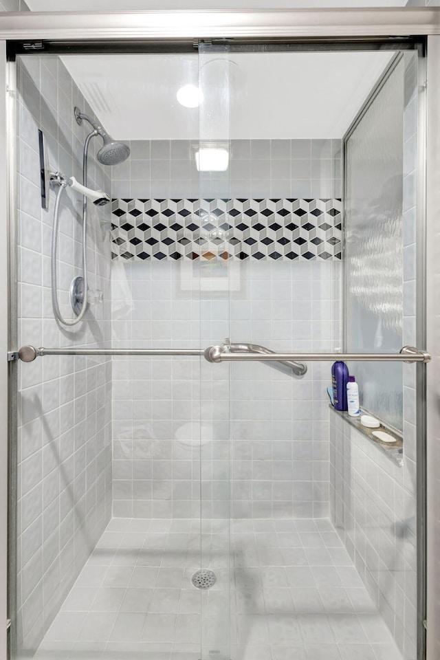 full bath featuring a stall shower