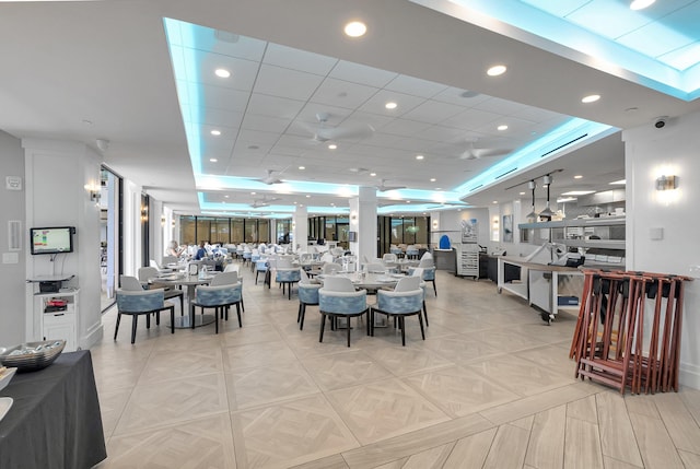 dining area with light tile patterned floors and recessed lighting