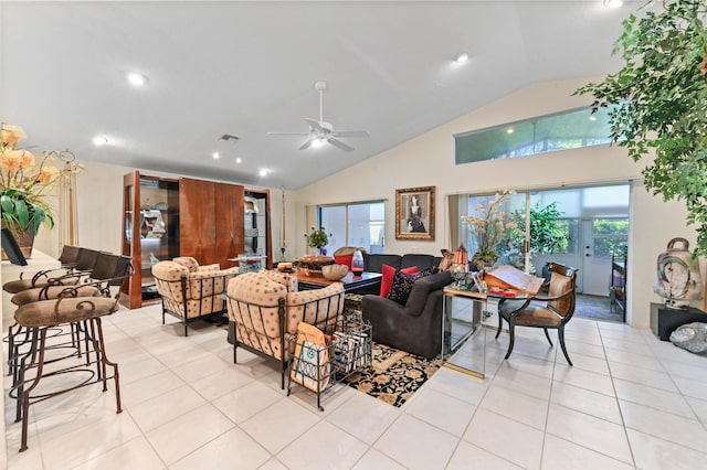 living area featuring high vaulted ceiling, ceiling fan, visible vents, and light tile patterned flooring